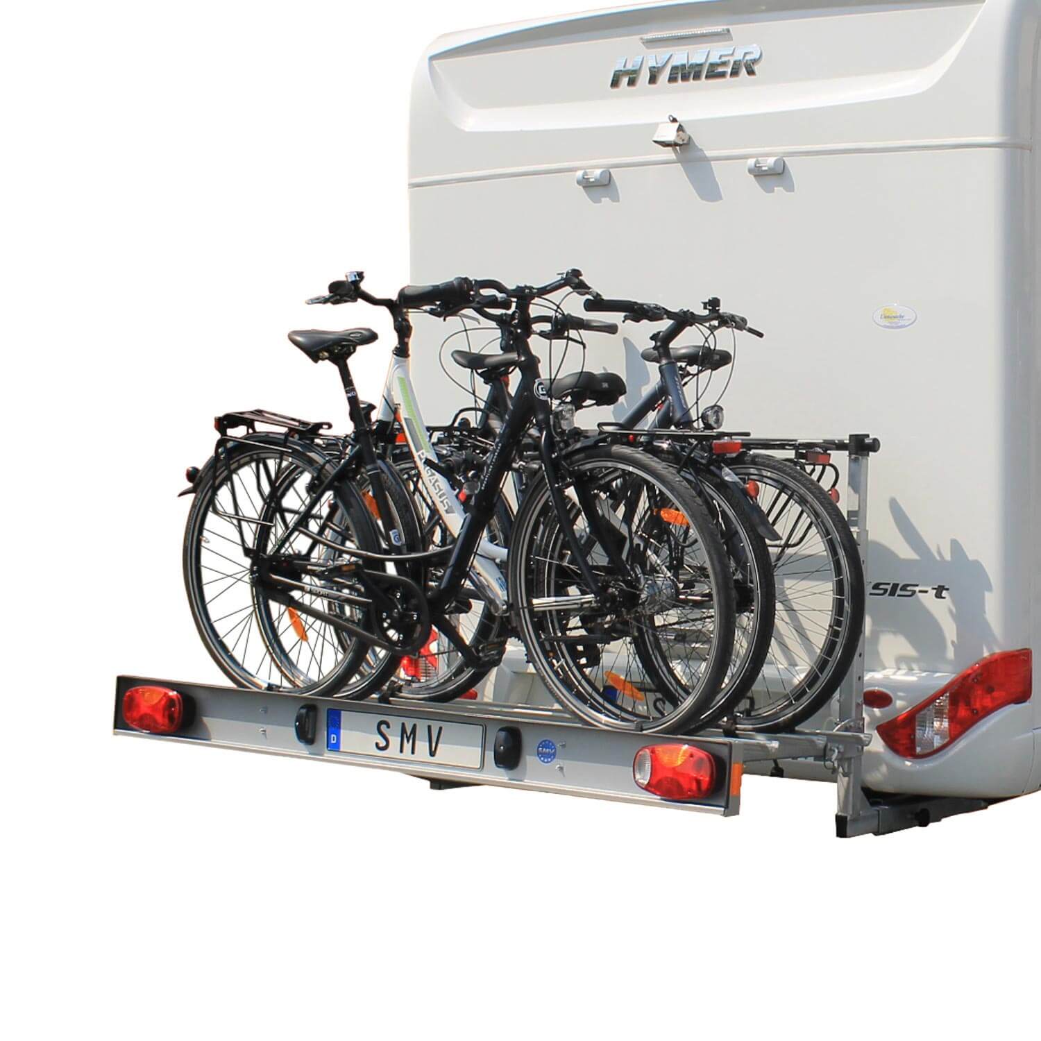 Vier Fahrräder auf SMV Rad Max Bike exklusiv an einem Wohnmobil montiert.